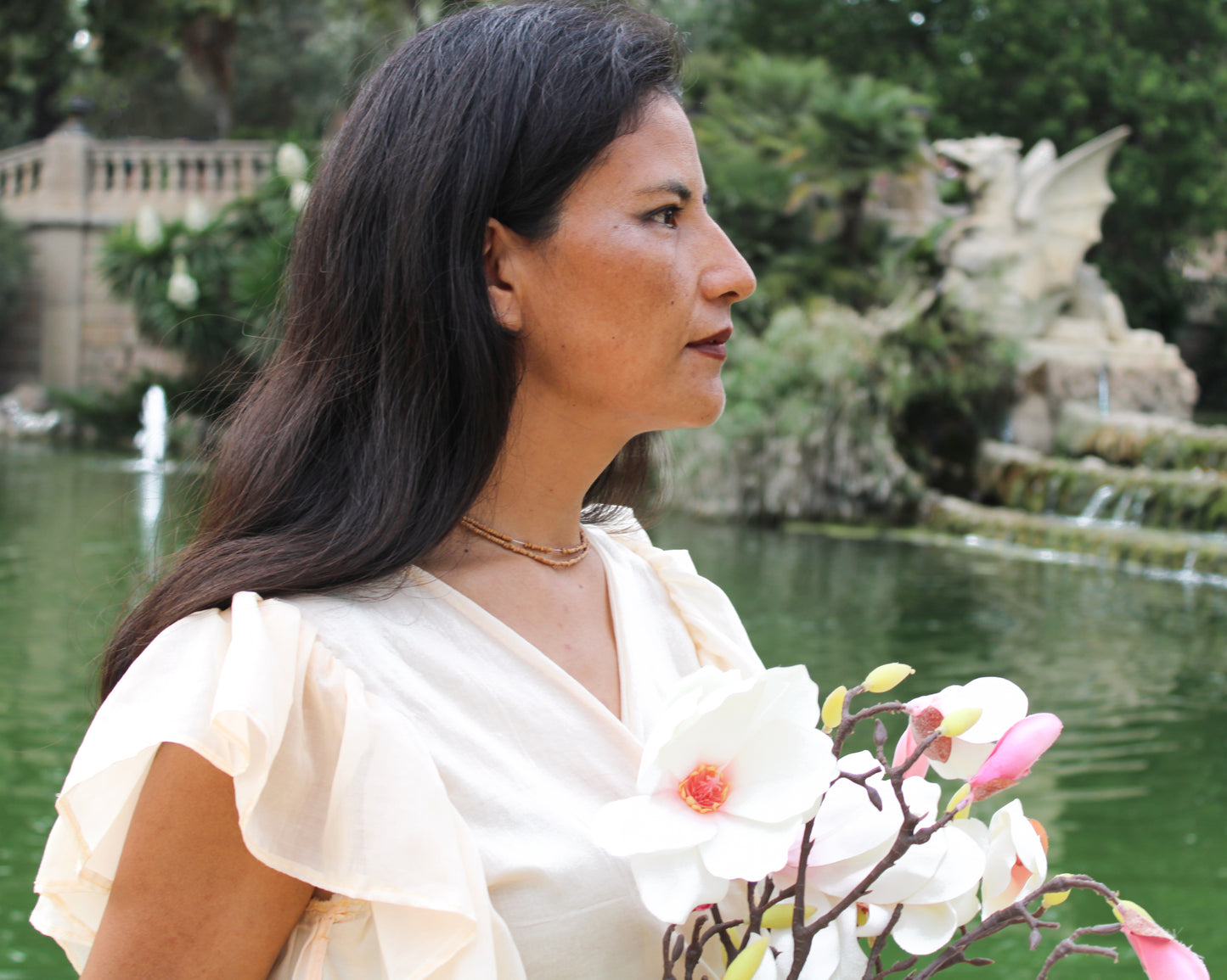 Short-sleeved blouse with ruffles and a fitted waist