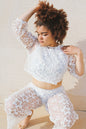 Conjunto pantalon campana y top con manga larga