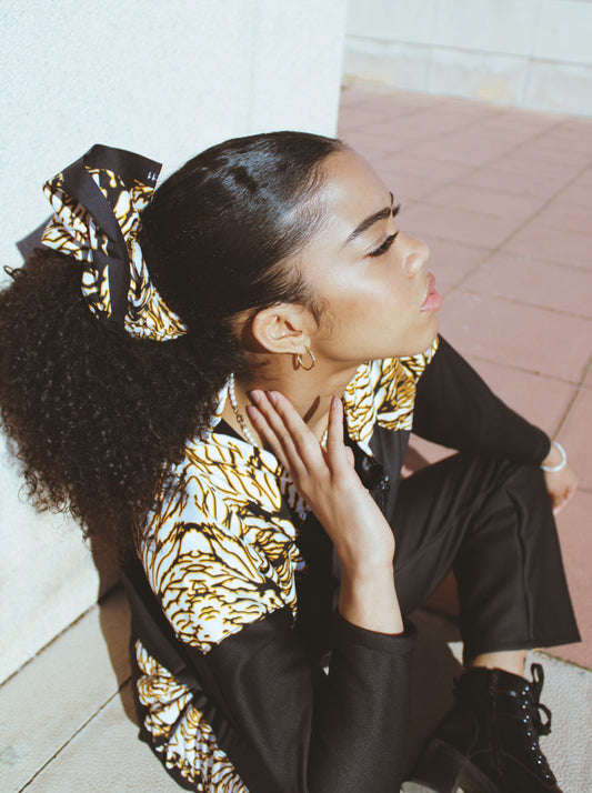 Bomber de manga 3/4 y pantalón campana con estampado lateral Wax