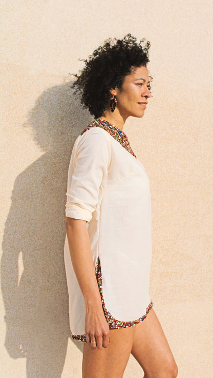 Vestido blusa manga larga con detalles de estampado wax