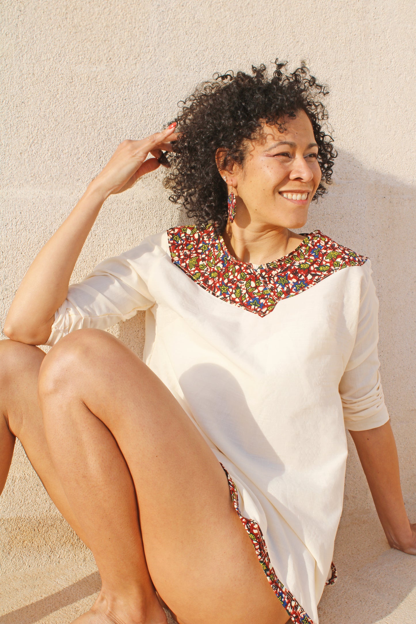 Vestido blusa manga larga con detalles de estampado wax